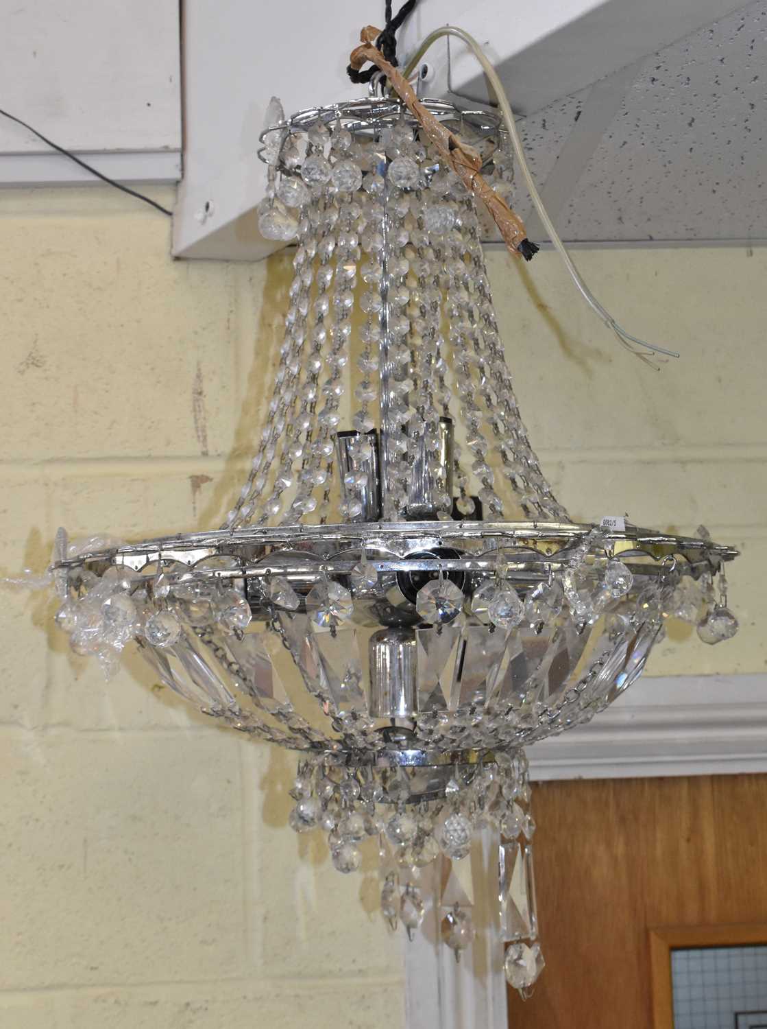 Lot 94 - A cut glass drop chandelier with stainless...
