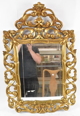 Lot 31 - A 19th century French ornate gilt framed wall...