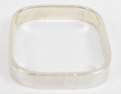Lot 636 - A chunky hallmarked silver bangle, approx...