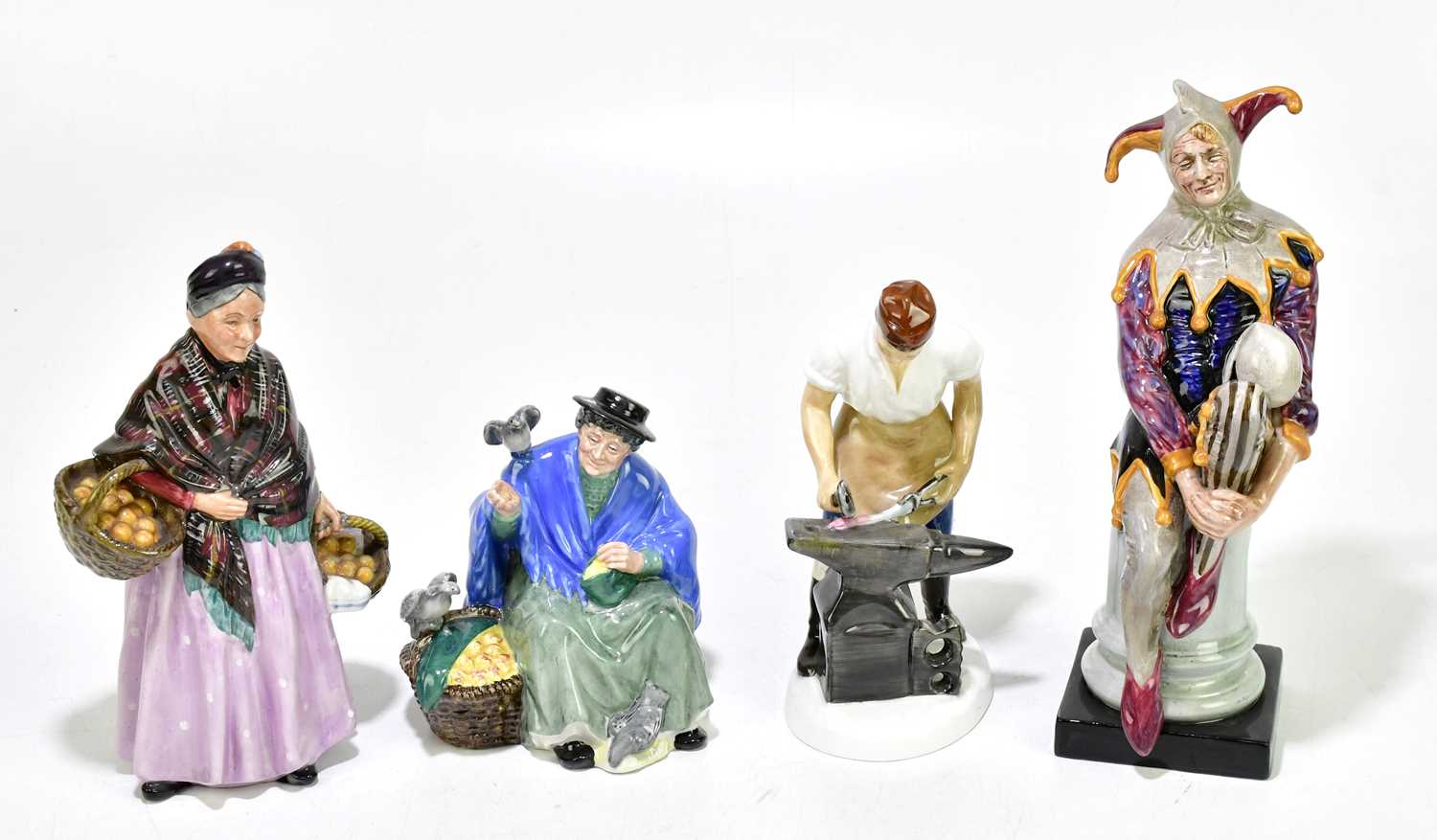 Lot 1378 - ROYAL DOULTON; a group of four figures...