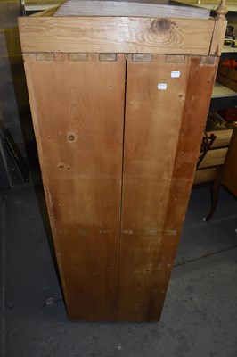 Lot 36 - A Continental pine linen press with three base...