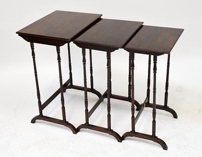 Lot 50 - An Edwardian rosewood nest of three tables...