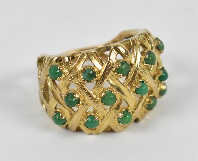 Lot 634 - A 9ct yellow gold dress ring set with fourteen...