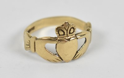 Lot 666 - A 9ct yellow gold lady's ring, size E, approx...