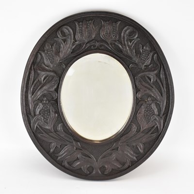 Lot 80 - A 19th century oval bevel edged mirror, height...