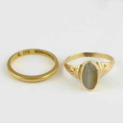 Lot 908 - A 22ct gold thin wedding band, size M, approx....