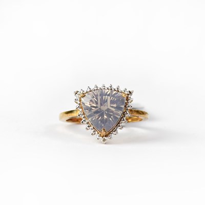 Lot 967 - A 9ct yellow gold dress ring set with quartz...