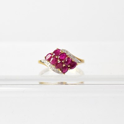 Lot 969 - A 9ct yellow gold dress ring, set with eight...