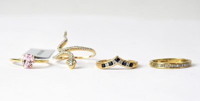 Lot 984 - Three 9ct yellow gold dress rings comprising a...