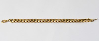 Lot 1042 - A yellow metal link bracelet, marked '777',...