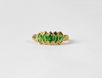 Lot 1003 - A 9ct yellow gold dress ring set with five...