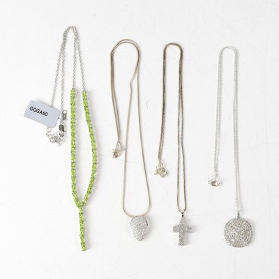 Lot 1166 - Four silver necklaces, comprising a disc...