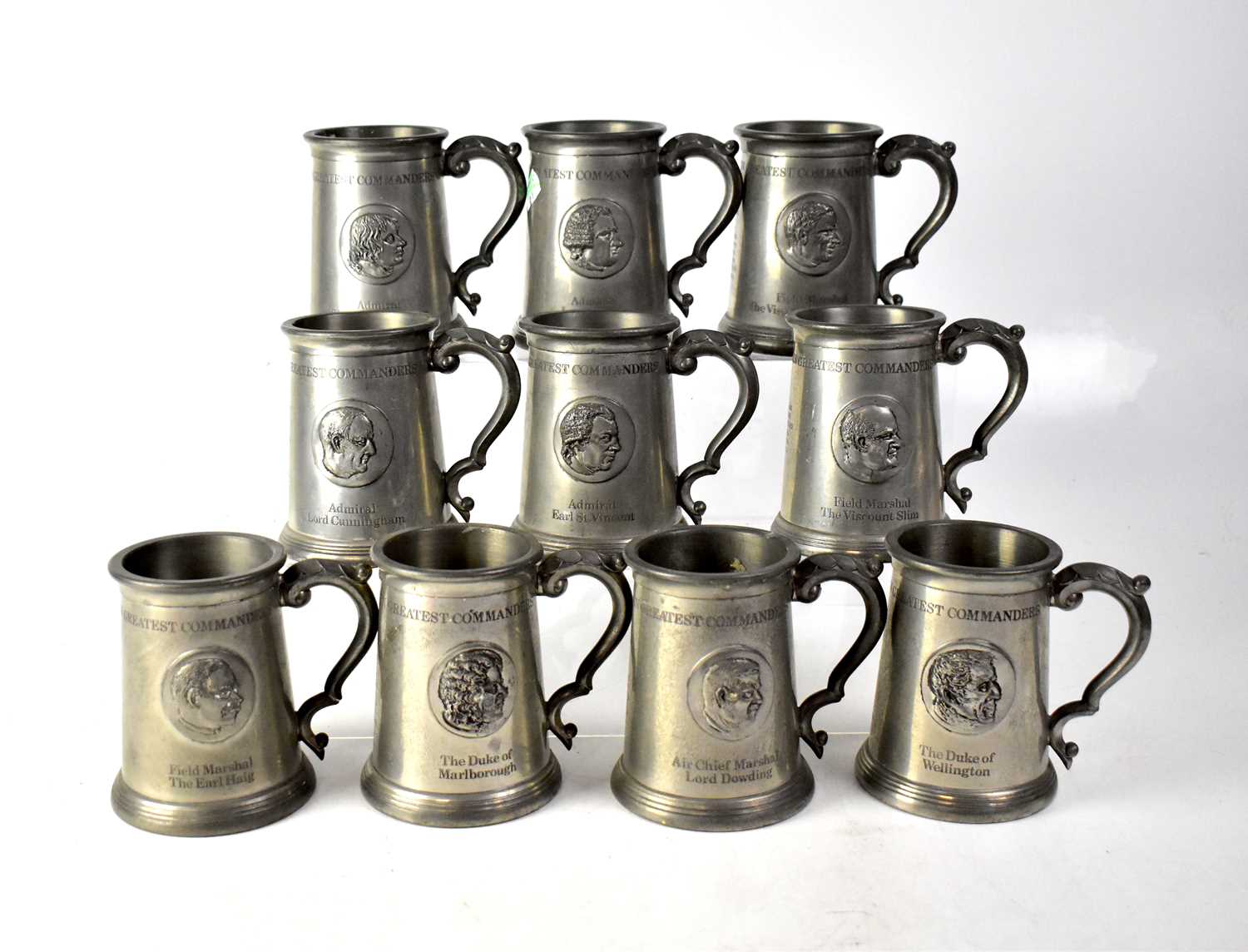 Lot 269 - A collection of ten commemorative glass bottom...