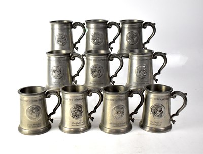 Lot 269 - A collection of ten commemorative glass bottom...