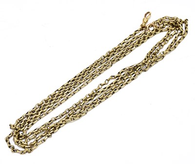 Lot 1330 - A yellow metal long guard with sprung clasp,...
