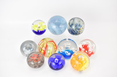 Lot 315 - Ten modern glass paperweights to include Royal...