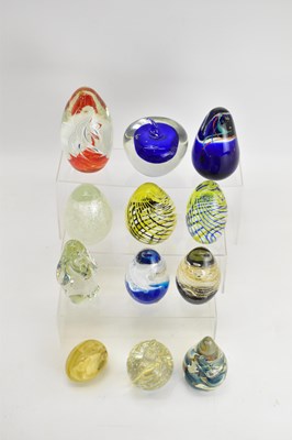 Lot 318 - Eleven glass paperweights including novelty...