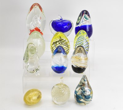 Lot 318 - Eleven glass paperweights including novelty...