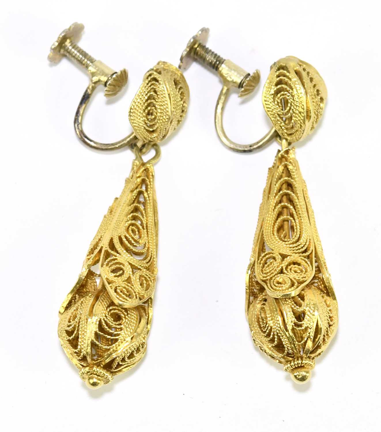 Lot 1482 - A pair of yellow metal filigree drop earrings,...