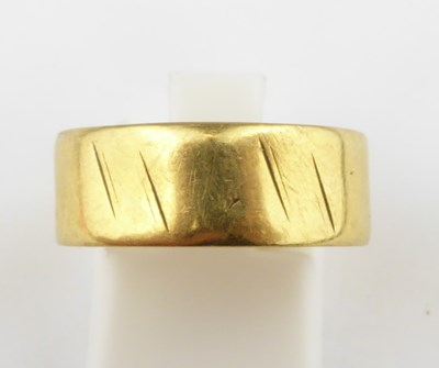 Lot 859 - A 22ct gold wide wedding band, size Q, approx....