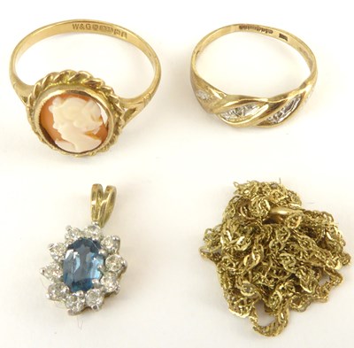 Lot 946 - Two 9ct gold dress rings comprising a white...