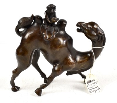 Lot 649 - A 19th century bronze figure of a monkey sitting on a camel's back