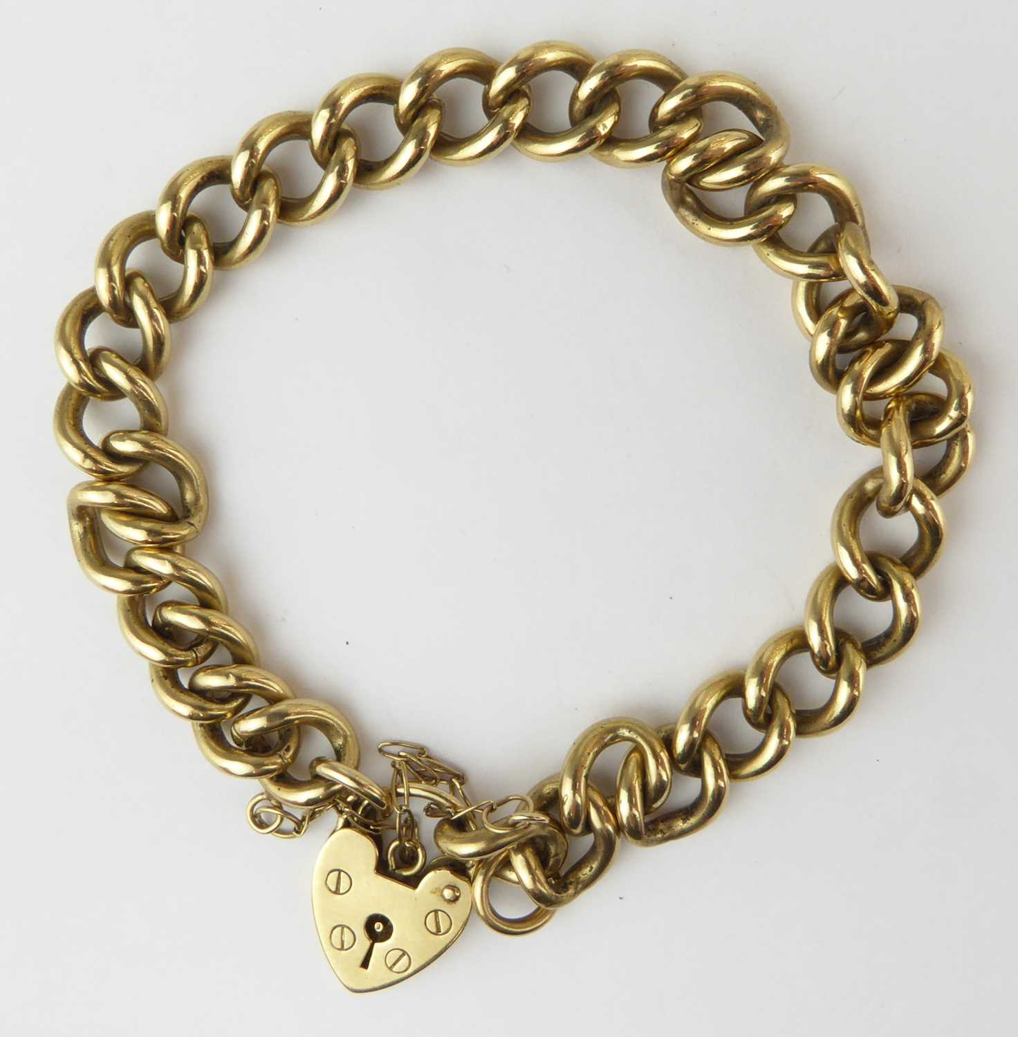 Lot 1030 - A 9ct gold belcher link bracelet with a 9ct...