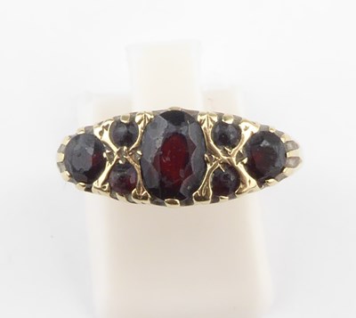 Lot 940 - A late 19th/early 20th century 9ct gold garnet...