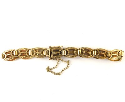 Lot 1025 - A 9ct gold anchor link bracelet with safety...