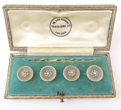 Lot 1225 - A cased set of four Art Deco circular floral...
