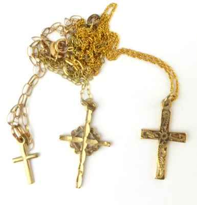 Lot 1124 - Three 9ct gold dainty necklaces, each with a...