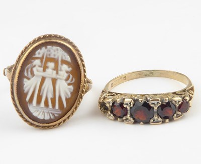 Lot 934 - A 9ct rose gold cameo ring depicting the Three...