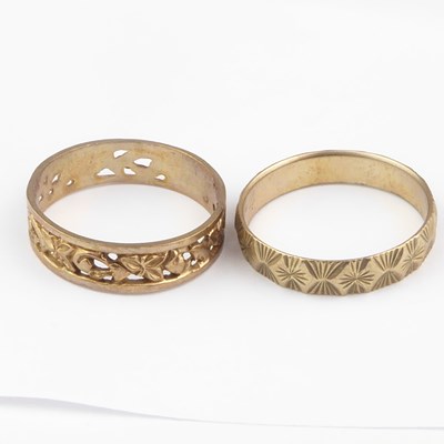 Lot 1010 - Two 9ct gold band rings with patterned shanks,...