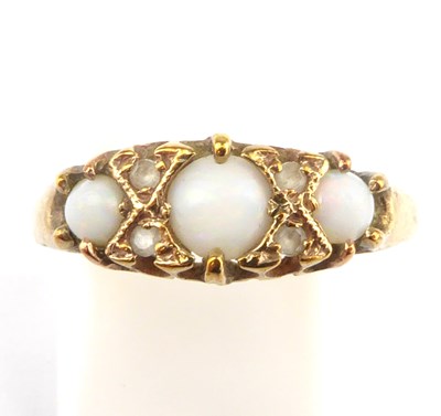 Lot 986 - A 19th century 9ct gold ring set with three...