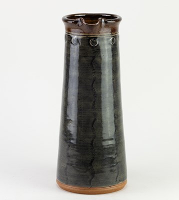 Lot 447 - JENNIE GILBERT; a tall stoneware Mishima jug,...