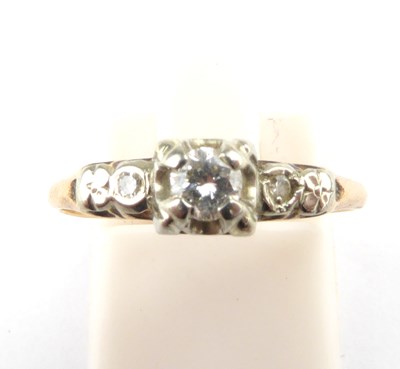 Lot 975 - An 18ct gold diamond ring, the principal claw...