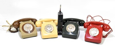 Lot 155 - Four rotary dial telephones and a vintage Motorola mobile phone