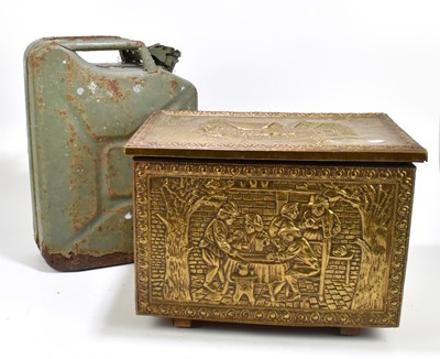 Lot 316 - A brass coal bin with embossed decoration