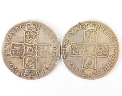 Lot 811 - Two Queen Anne silver half crowns, comprising...