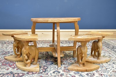 Lot 1704 - A walnut shaped rectangular elephant coffee...