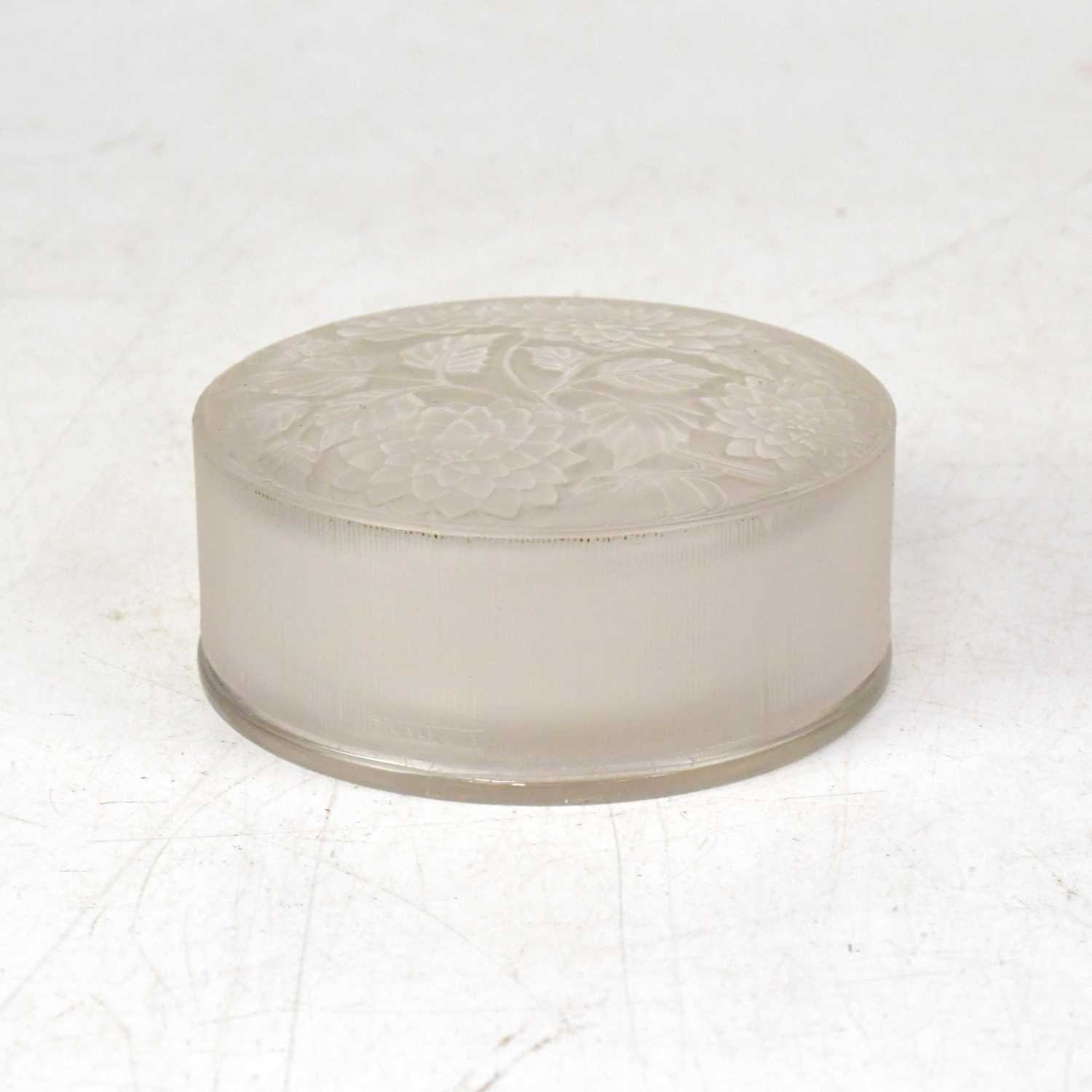 Lot 311 - LALIQUE; a circular opaque glass powder bowl...