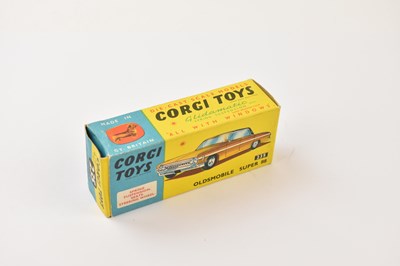 Lot 153 - CORGI; a boxed number 235 Oldsmobile Super 88.