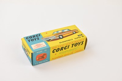 Lot 153 - CORGI; a boxed number 235 Oldsmobile Super 88.