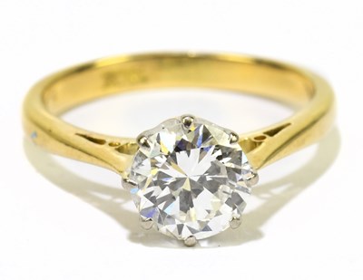 Lot 1002 - An 18ct yellow gold and diamond solitaire ring,...