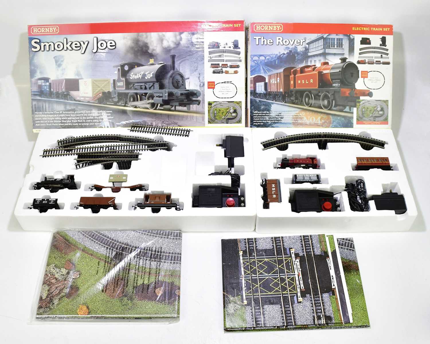 Lot 175 - HORNBY; two boxed electric train sets, Smokey...