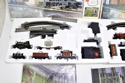 Lot 175 - HORNBY; two boxed electric train sets, Smokey...