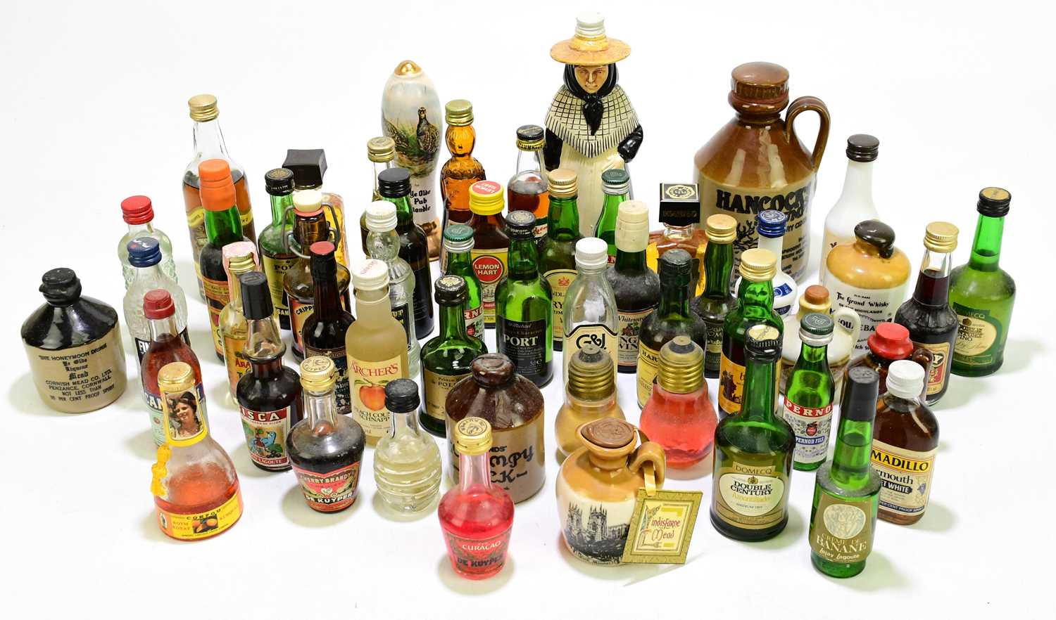 Lot 4112 - A collection of assorted alcohol miniatures,...