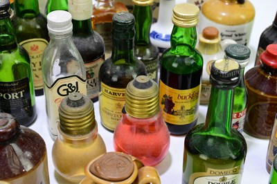 Lot 4112 - A collection of assorted alcohol miniatures,...