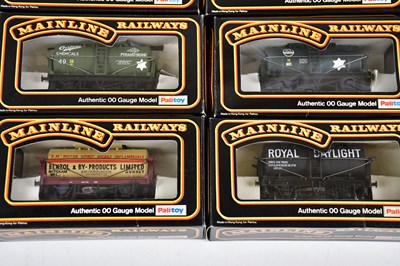 Lot 164 - MAINLINE; sixteen boxed OO gauge wagons, to...