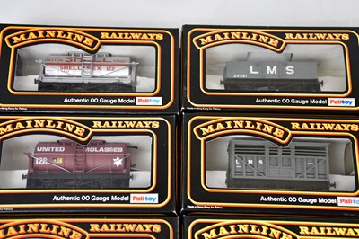 Lot 164 - MAINLINE; sixteen boxed OO gauge wagons, to...